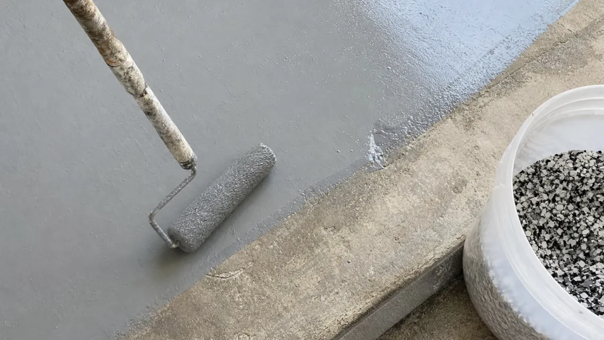 Garage floor grinding preparation before coating in a Phoenix East Valley garage